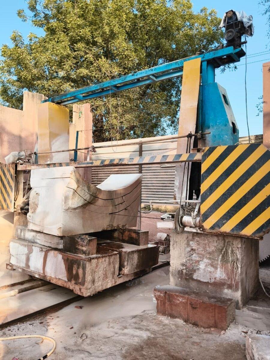 Raw sandstone blocks stored at the workshop before cutting