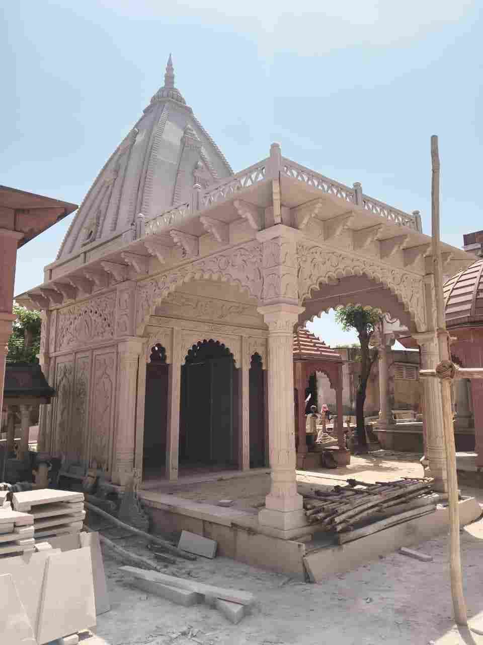 Hand-carved sandstone jali design for temple architecture