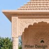 Outdoor pink sandstone temple pillar and carved arch design