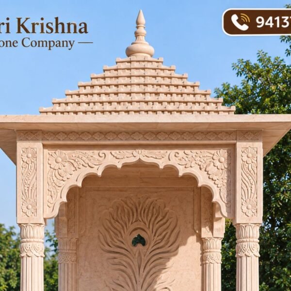 Pink stone temple front view with floral arch carving