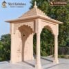Pink sandstone mandap side view with detailed rear panel carving