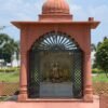 red sandstone home temple with stone jali