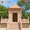 Pink sandstone garden temple front view with carved pillars and entrance